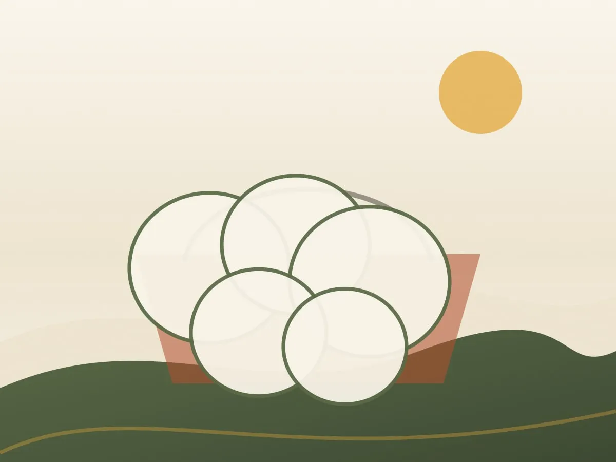Farm-fresh eggs gathered in a basket in morning light.